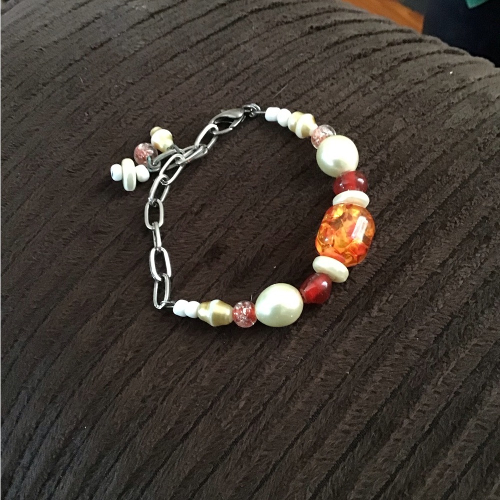 Handmade Beaded Bracelet with Orange and Cream Accents